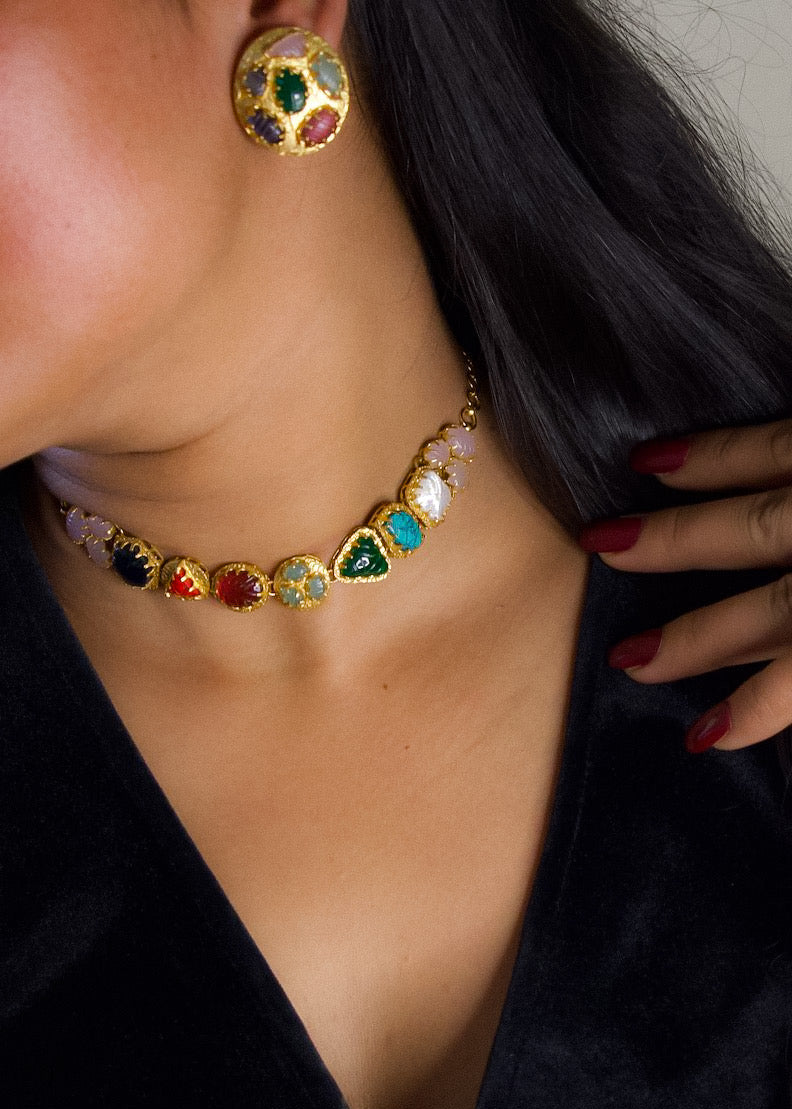 Multi-stone navrattan choker with matching studs, close-up showing detailed setting