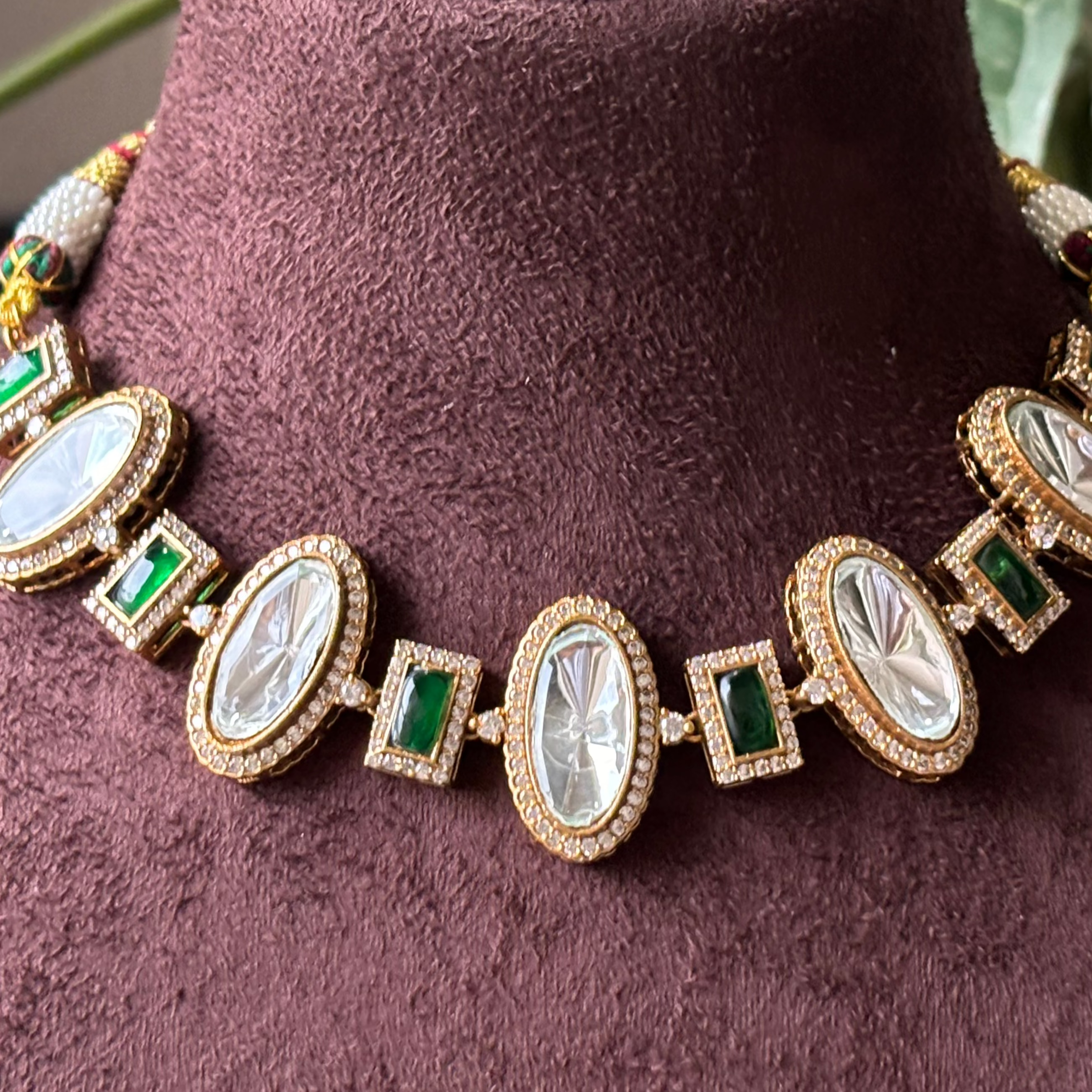 Side angle of polki kundan necklace with adjustable thread closure