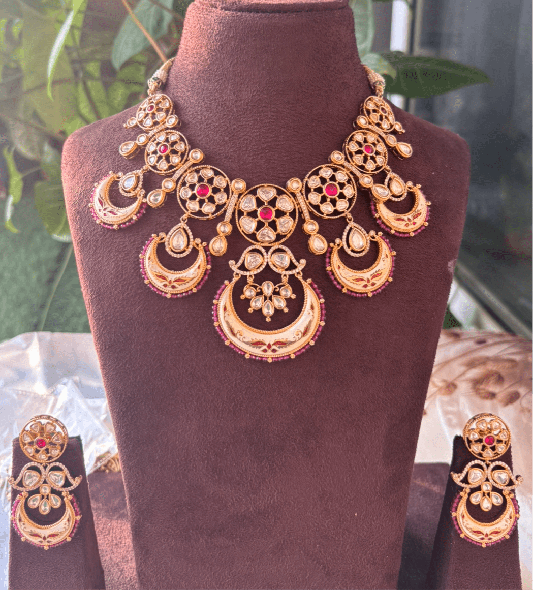 Navya Crescent uncut Kundan Jewelry Set with matching earrings and maangtikka - MR Jewels